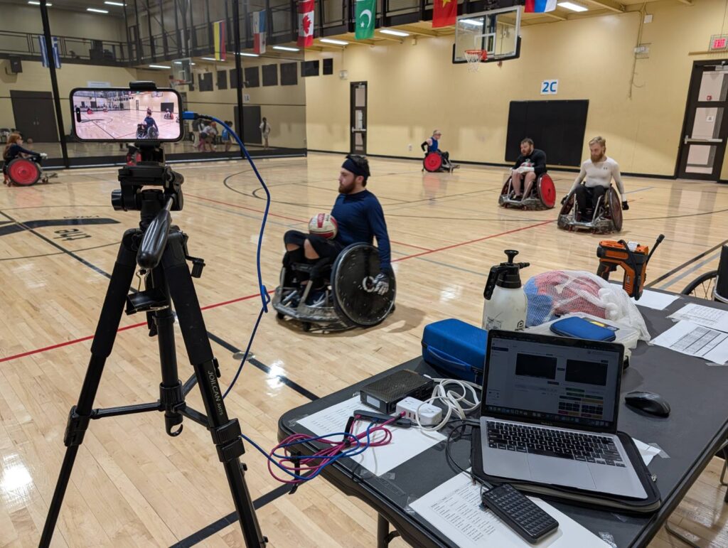 behind the scenes of the court behind the scene of stream setup at wheel chair rugby match