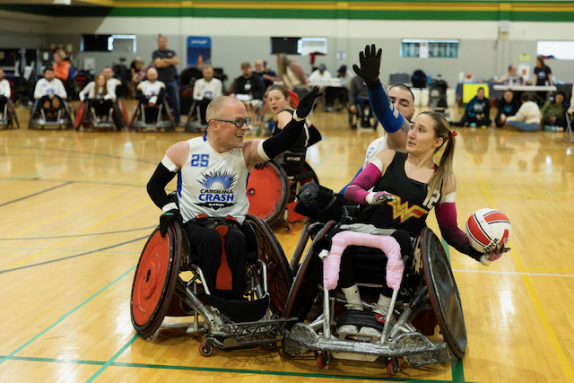 girl in possession while other guy trys to block girl in possession while other guy try's to block her